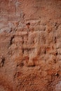 Vertical texture of a cemented brick wall with dents Royalty Free Stock Photo