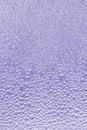 Vertical textured background of Very Berry color. Ribbed abstract empty lilac background