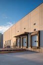 Vertical three quarter exterior view of a professional warehouse building showcasing loading docks and modern architecture with Royalty Free Stock Photo