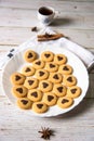 Vertical top view of fresh cookies with cinnamon sticks Royalty Free Stock Photo