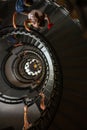 Vertical top view of kids running up the stairs of Ponce Inlet Lighthouse in Florida