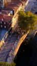 Vertical top view of people on the riverside near traditional buildings in Porto, Portugal Royalty Free Stock Photo