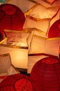 Vertical top view of round and formless illuminated paper lanterns