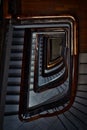 Vertical top view shot of a spiraling staircase