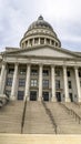 Vertical Utah State Capital building dome and stairs leading to the pedimented entrance Royalty Free Stock Photo