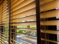 A vertical venetian blinds with a daylight through the window Royalty Free Stock Photo
