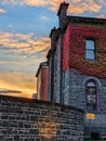 Vertical of the Victoria Barracks military base in Southbank, Australia with a background of sunset