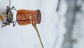 Copper Cezve with coffee in winter mountains