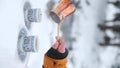 Copper Cezve with coffee in winter mountains