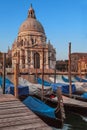 Vertical view of Basilica Santa Maria Della Salute by the Grand Canal under the blue sky in Venice Royalty Free Stock Photo