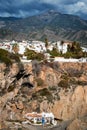 Vertical view of beautiful city of Nerja in winter. Empty `Calahonda` beach. Royalty Free Stock Photo