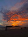 Vertical view of a beautiful sunset at Pantai Cenang Beach, Langkawi, Malaysia Royalty Free Stock Photo