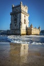 Vertical view of the Belem tower and reflection at the riverside of Tejo River Royalty Free Stock Photo