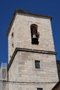 Vertical view. Bell tower of the Parish Church of the Assumption (16th century). Cadalso de los Vidrios, Madrid, Spain