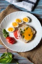 Vertical view of bread slice with poached egg Royalty Free Stock Photo