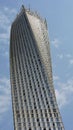 Vertical view of the Cayan Tower, a modern skyscraper with a twisted design in Dubai, UAE Royalty Free Stock Photo