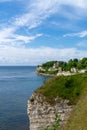 Vertical view of the church at Hojerup on top of the white chalkstone cliffs of Stevns Klint Royalty Free Stock Photo