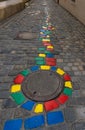 Vertical view the colorful cobblestones in the HÃllgasse Artists Alley Royalty Free Stock Photo