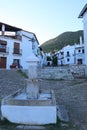 Vertical view. Fountain next to the town hall square in Linares de la Sierra, Huelva, Spain