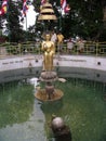 Vertical view. Fountain where tourists throw coins at the Swayambhunath Temple, the monkey temple. Kathmandu, Nepal