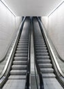 Vertical view of a long an empty escalator in a train station Royalty Free Stock Photo