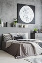 Vertical view of a modern bedroom interior in grey color with a