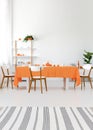 Modern interior. Long dining room table with chairs. White walls and floor, orange details. Real photo concept