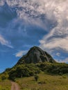 Vertical view of Mount Tibrogargan in Australia against a beautiful blue sky Royalty Free Stock Photo