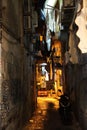 Vertical view in a narrow alley in Naples, Italy.