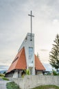 Vertical View of the New Reconstructed Saborsko Catholic Parish Church in Croatia. Big Cross, Symbol of Christianity, at the Top
