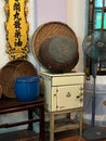 Vertical view of an oven and baskets in Baba & Nyonya Heritage Museum in Malaysia Royalty Free Stock Photo