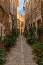 vertical view of a picturesque village street in the quaint mountain town of Fornalutx in northern Mallorca Royalty Free Stock Photo