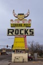 Vertical view of the Pow Wow Trading Post vintage sign at 752 Navajo Blvd in downtown Holbrook