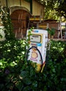 Vertical view of a shell fuel dispenser in the green leaves