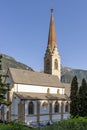 Vertical view of the Stadtpfarrkirche Maria Himmelfahrt church in Landeck, Austria, on a beautiful sunny day Royalty Free Stock Photo