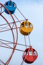 Vertical view of a stopped ferris wheel under the clean blue sky without people Royalty Free Stock Photo