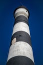 Vertical view of a striped lighthouse in Villa Gesell Partido, Argentina Royalty Free Stock Photo