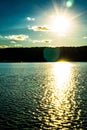 Vertical view of the sunset reflecting on the Hudson River, seen from the Yonkers waterfront Royalty Free Stock Photo