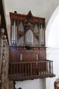 Vertical view of the 18th century organ of the Santiago el Mayor church in Castano del Robledo, Huelva, Spain Royalty Free Stock Photo