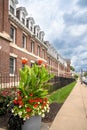 Vertical view of the three story red brick Quadrangle Dormitories (The Quad). a student dormitory