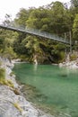 Vertical view to the Swinging Bridge over the Blue Pools and the Makarora River, Haast Pass, West Coast, South island, New Zealand Royalty Free Stock Photo