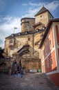 Vertical view of tourists walking down the stairs of Orava castle in Oravsky Podzamok, Slovakia