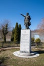 Vertical view of Unico Park`s statue of Christopher Columbus and the park commemorating