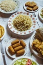 Vertical view of variety of dishes on fast food restaurant table