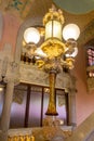 Vertical view of a vintage lamp column in the interior of Palau de la Musica in Barcelona