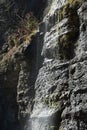 Vertical view of water dripping from mesmerizing rocks at Mine Kill waterfall in Gilboa, New York Royalty Free Stock Photo