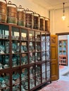 Vertical view of the wooden shelf with dishes in Baba & Nyonya Heritage Museum in Malaysia Royalty Free Stock Photo