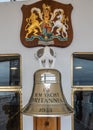 Vertical of a vintage bell in the interior of Royal Yacht Britannia, Edinburgh, Scotland