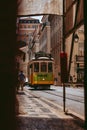 Vertical of a vintage tram in the streets of Lisbon, Portugal