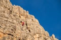 Vertical walls with climber Cinque Torri